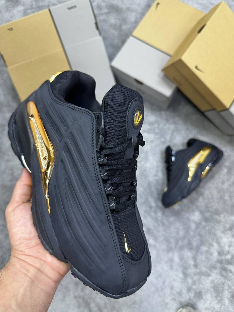 NOCTA (NEGRO ORO)